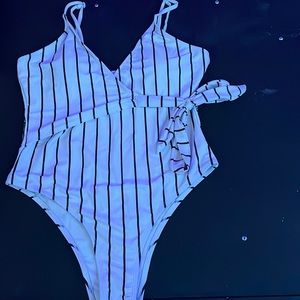 Women’s one piece swimwear. Size Large